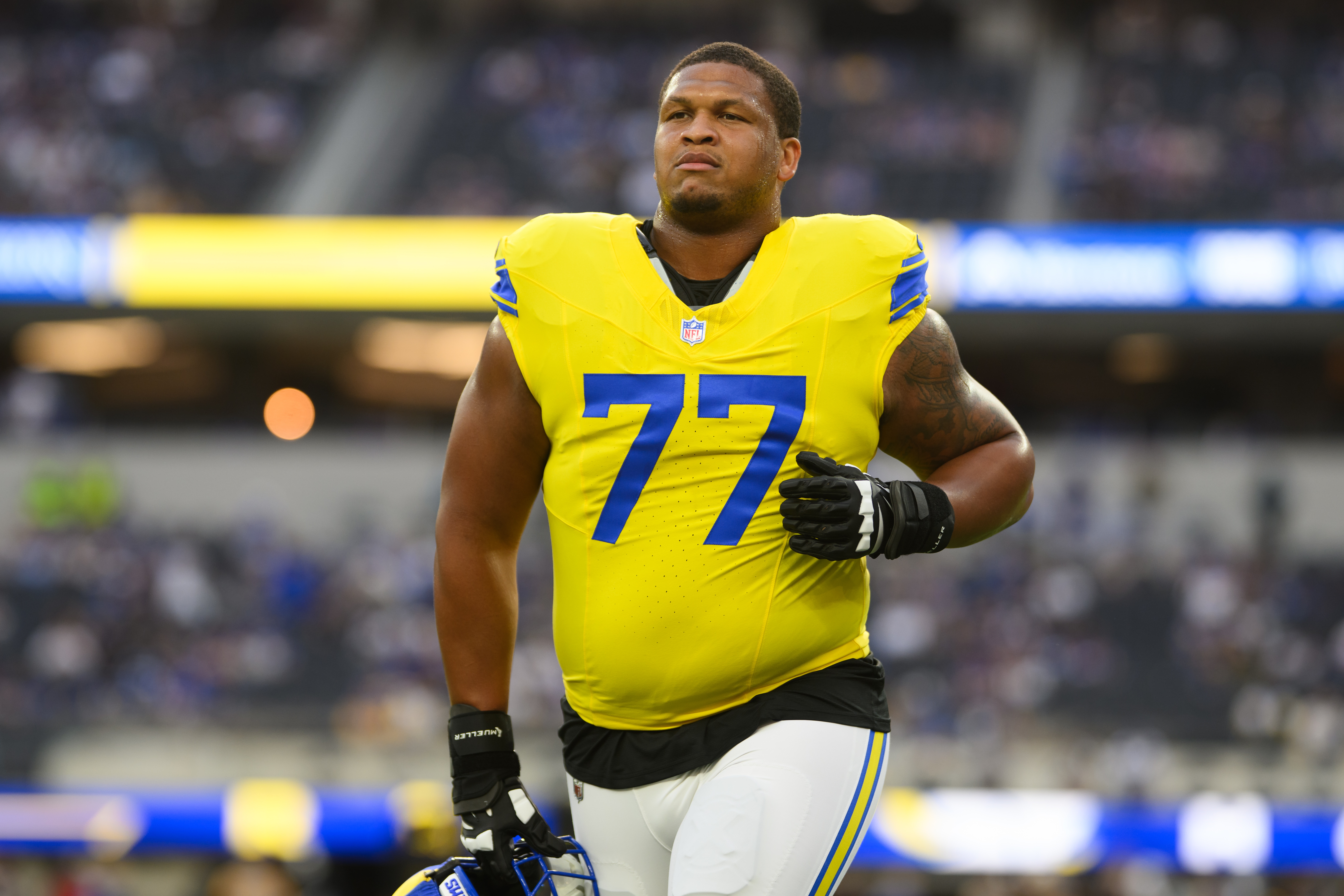 Rams lineman Alaric Jackson has suspension reduced to 1 game for punching Bills' Chubb