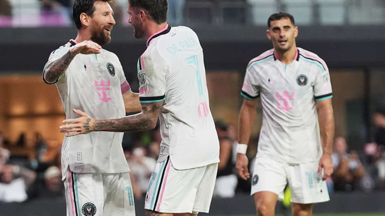 Inter Miami forward Lionel Messi, left, congratulated midfielder Rodrigo de Paul (7) after de Paul scored a goal during the first half of an MLS soccer match against New York City FC, Wednesday, Oct. 14, 2026, in Miami.