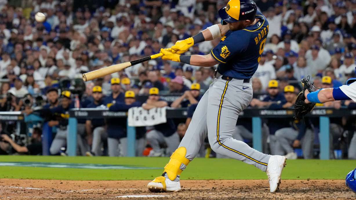 Milwaukee Brewers first baseman Jake Bauers connects for a two run home run during the seventh inning of Game 3 of baseball's National League Championship Series between the Milwaukee Brewers and the Los Angeles Dodgers, Wednesday, Oct. 14, 2026, in Los Angeles.