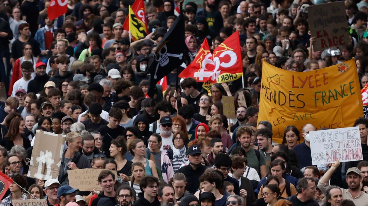 Students march to protest against under-resourced schools in Rennes, France, Tuesday, Oct. 13, 2026.