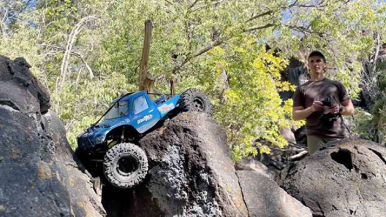 Bryce Shurtliff drives his crawler on some rocks at Lower Ross Park in Pocatello, Idaho. Shurtliff is working to bring more remote-control hobbyists into his fold.