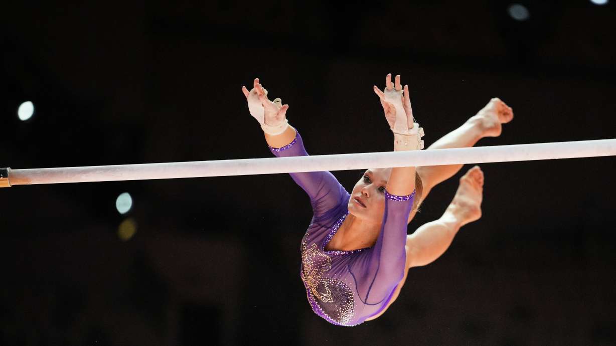 FILE - Individual Neutral Athlete Angelina Melnikova competes in the women's uneven bars final during the 53rd Artistic Gymnastics World Championships in Jakarta, Indonesia, on Oct. 24, 2025.