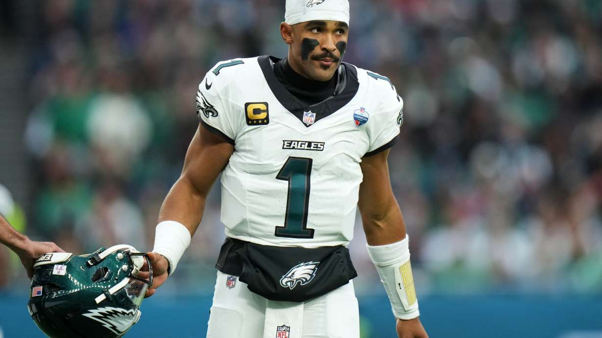 Philadelphia Eagles quarterback Jalen Hurts (1) stands on the field during an NFL football game against Jacksonville Jaguars in London, Sunday, Oct. 11, 2026.