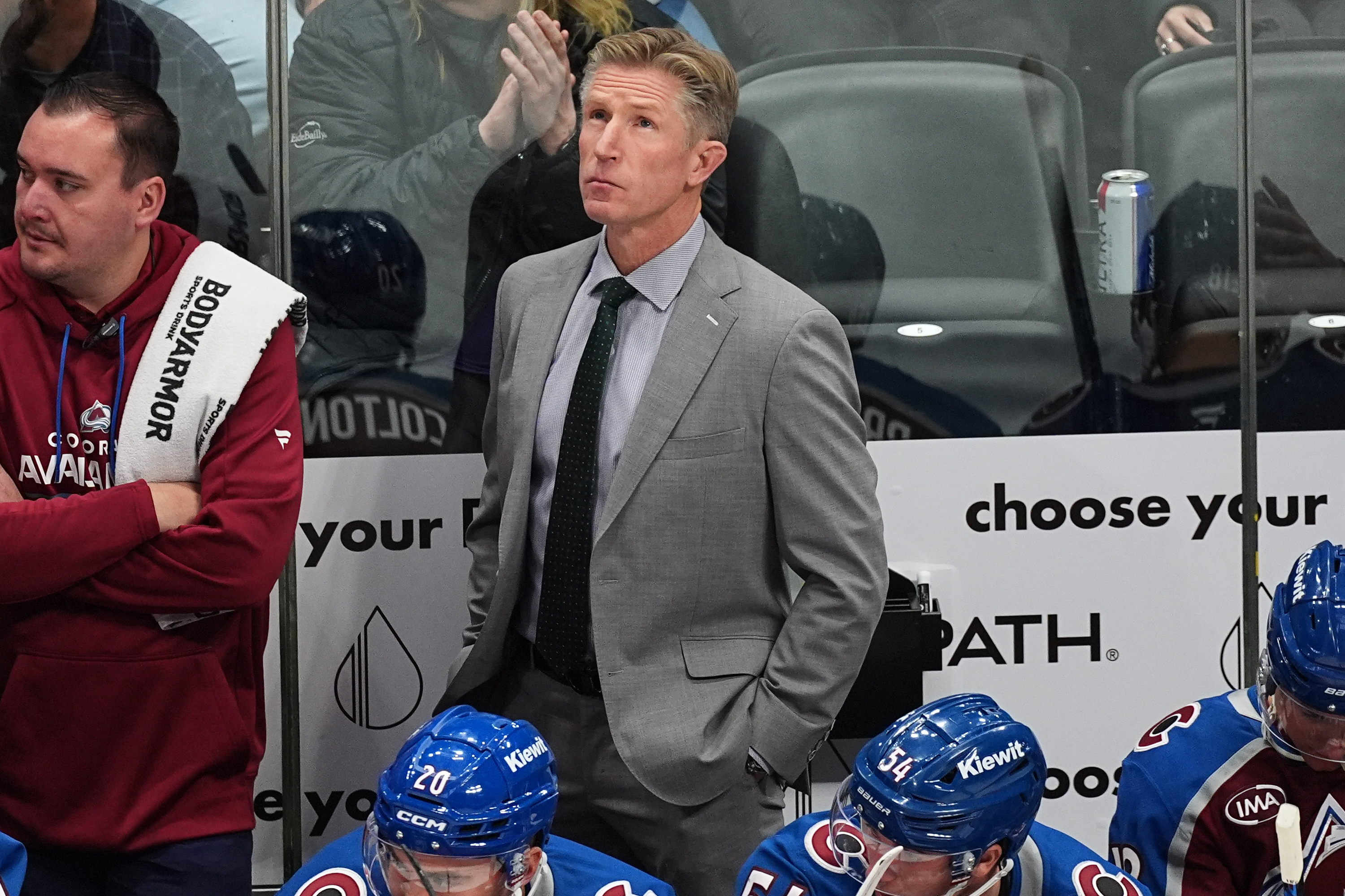 FILE - Colorado Avalanche assistant coach Dave Hakstol looks on from the team box in the first period of an NHL hockey game, Oct. 28, 2025, in Denver. 