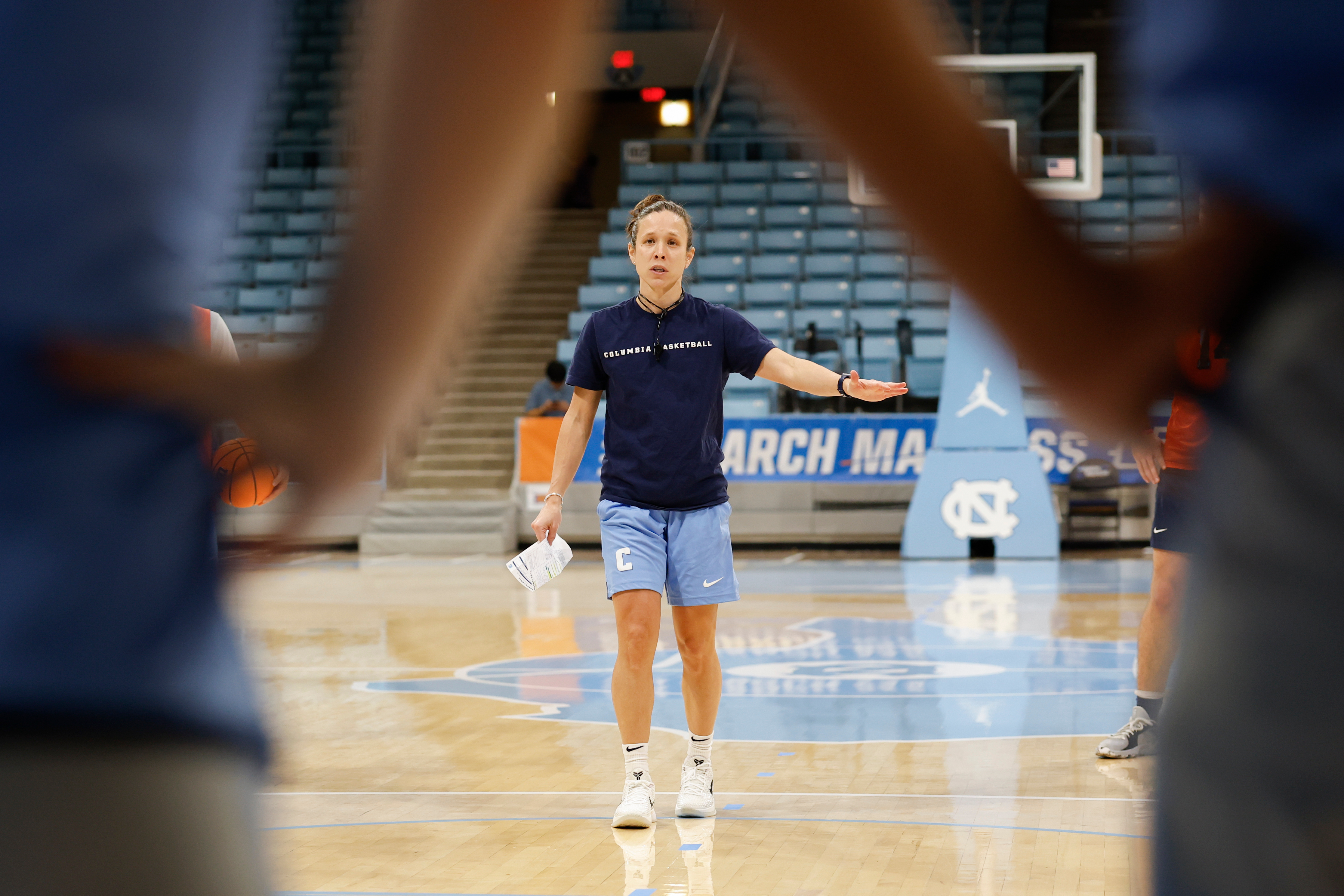 FILE - Columbia head coach Megan Griffith talks to her team during NCAA college basketball practice in Chapel Hill, N.C., March 19, 2025. 