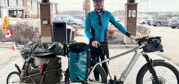 Cancer survivor cycles around the world to raise awareness for cancer research