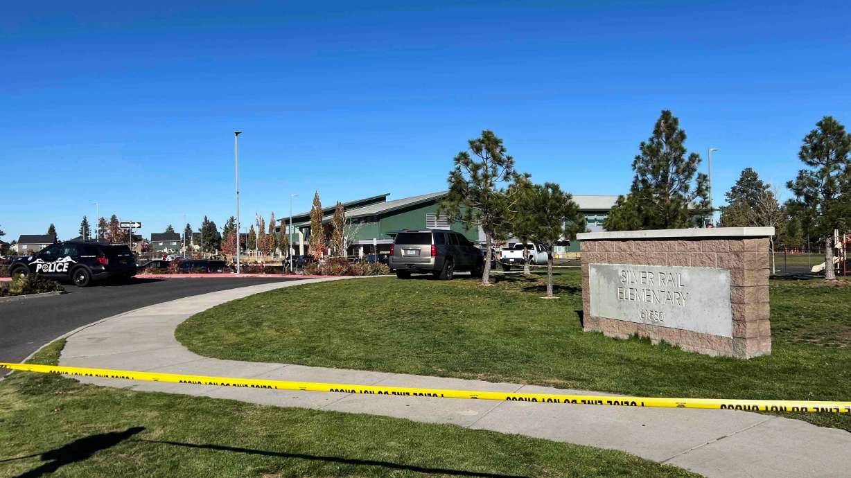Police tape is placed outside Silver Rail Elementary School, where a shooting took place, on Thursday, in Bend, Ore. At least two people were hospitalized Thursday following a shooting at an elementary school in Bend, Oregon, and the shooter is dead, authorities say.