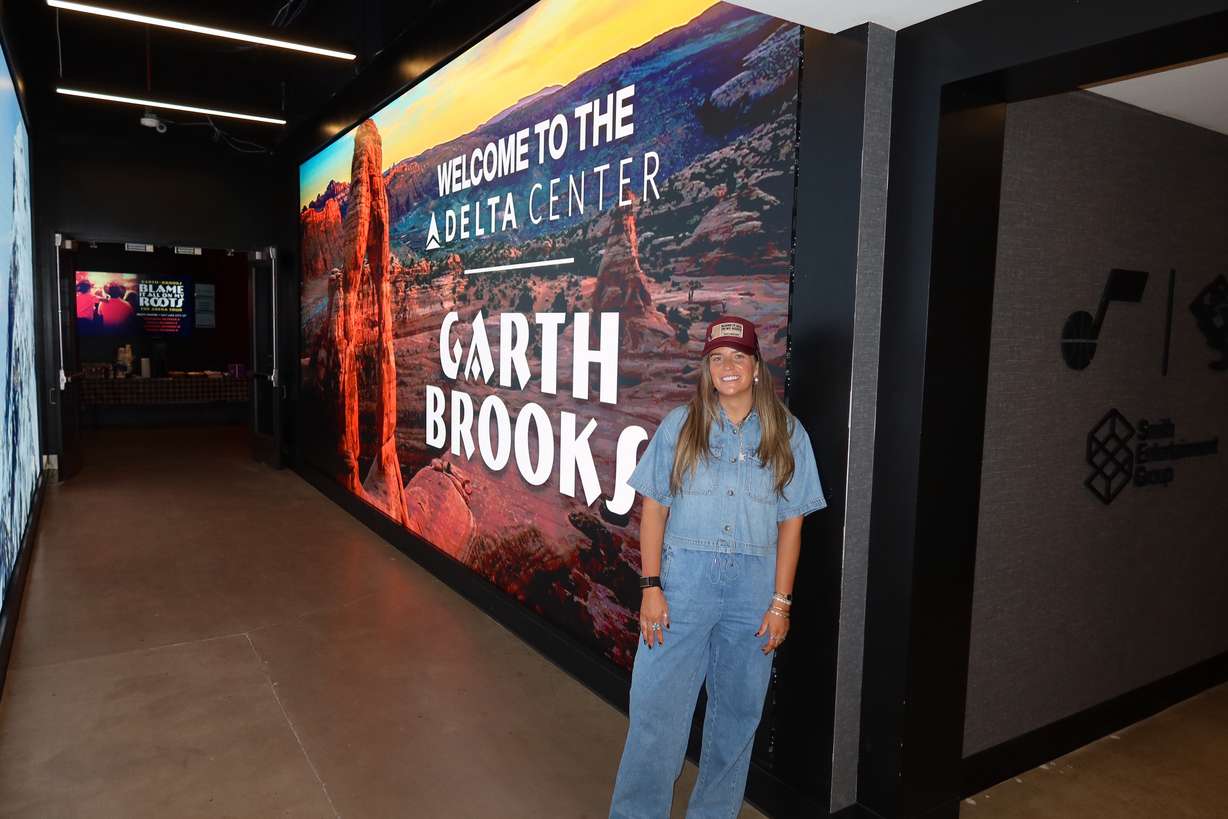 Avree Eveson, owner of The Hat Haus, poses at the Delta Center where Garth Brooks performed four concerts last week.