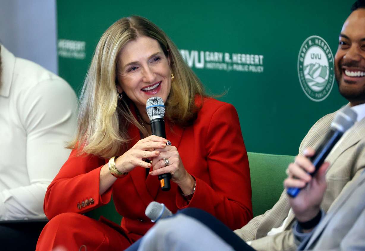 Margaret Busse, Utah Department of Commerce commissioner, talks on a panel about Utah’s approach to AI regulation at the AI: The Regulatory Frontier summit at UVU’s Lehi campus on Thursday.