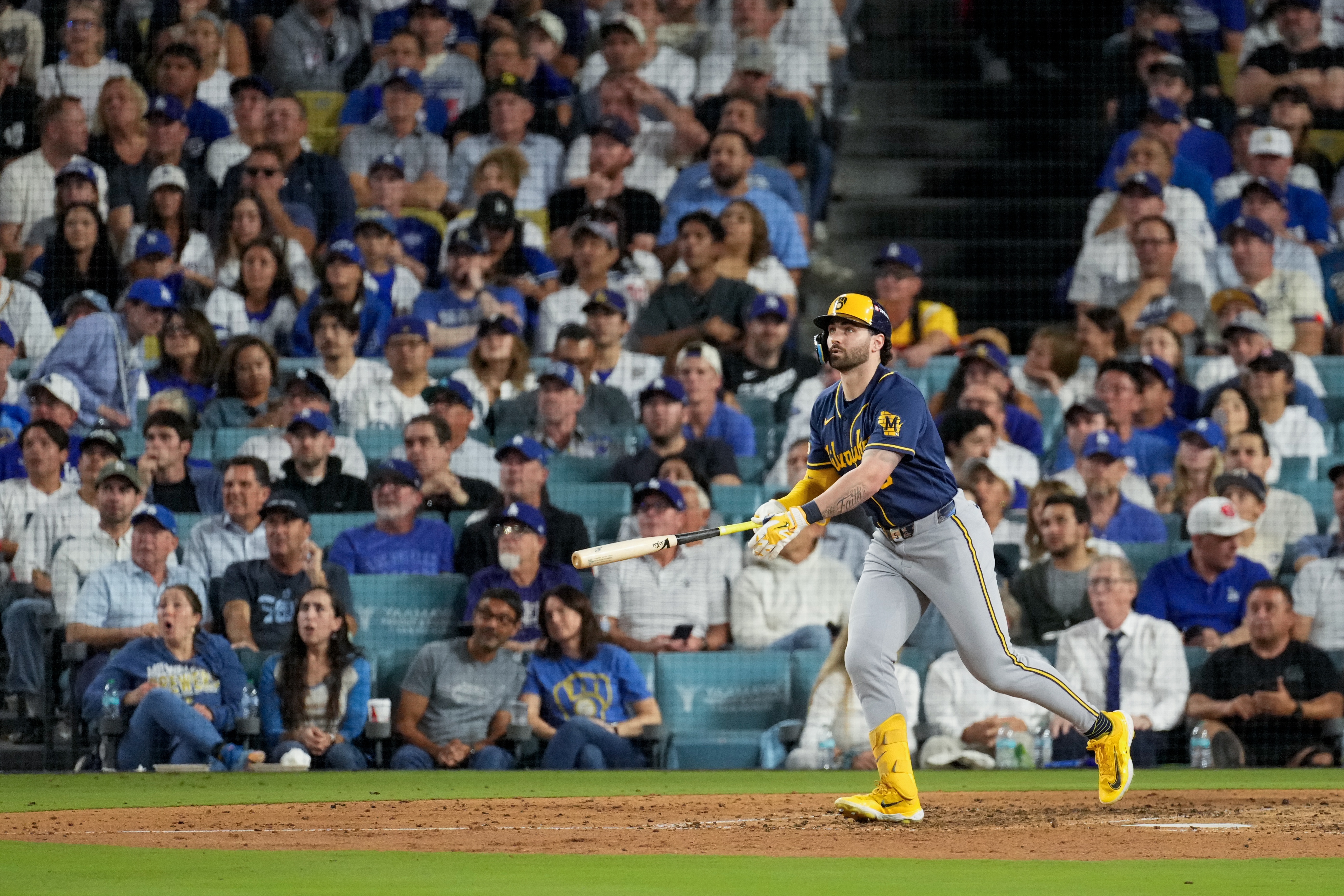 Milwaukee Brewers center fielder Garrett Mitchell follows through on his solo home run during the sixth inning of Game 4 of baseball's National League Championship Series between the Milwaukee Brewers and the Los Angeles Dodgers, Thursday, Oct. 15, 2026, in Los Angeles. 