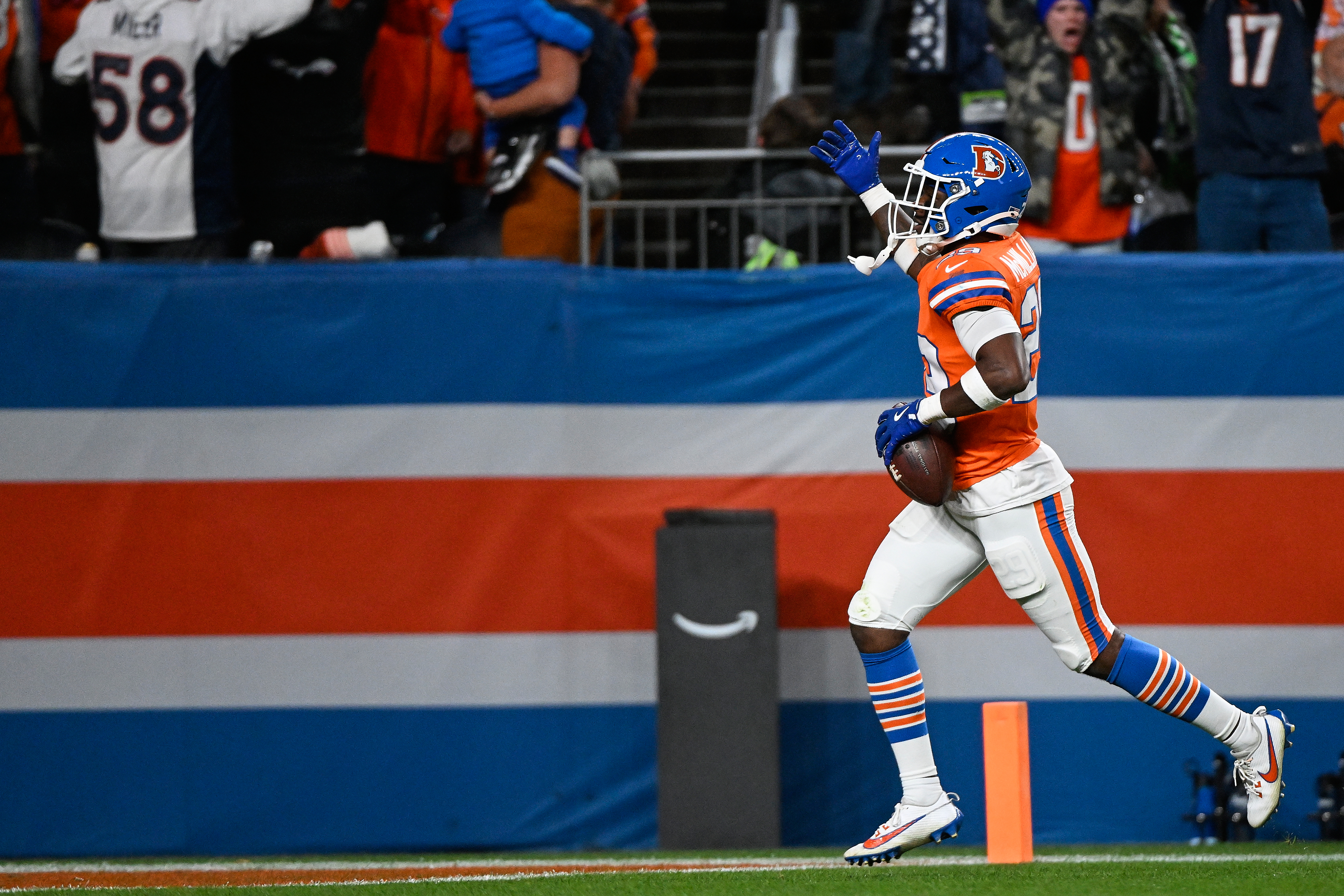 Denver Broncos cornerback Ja'Quan McMillian celebrates an interception against the Seattle Seahawks during overtime in an NFL football game in Denver, Thursday, Oct. 15, 2026. 