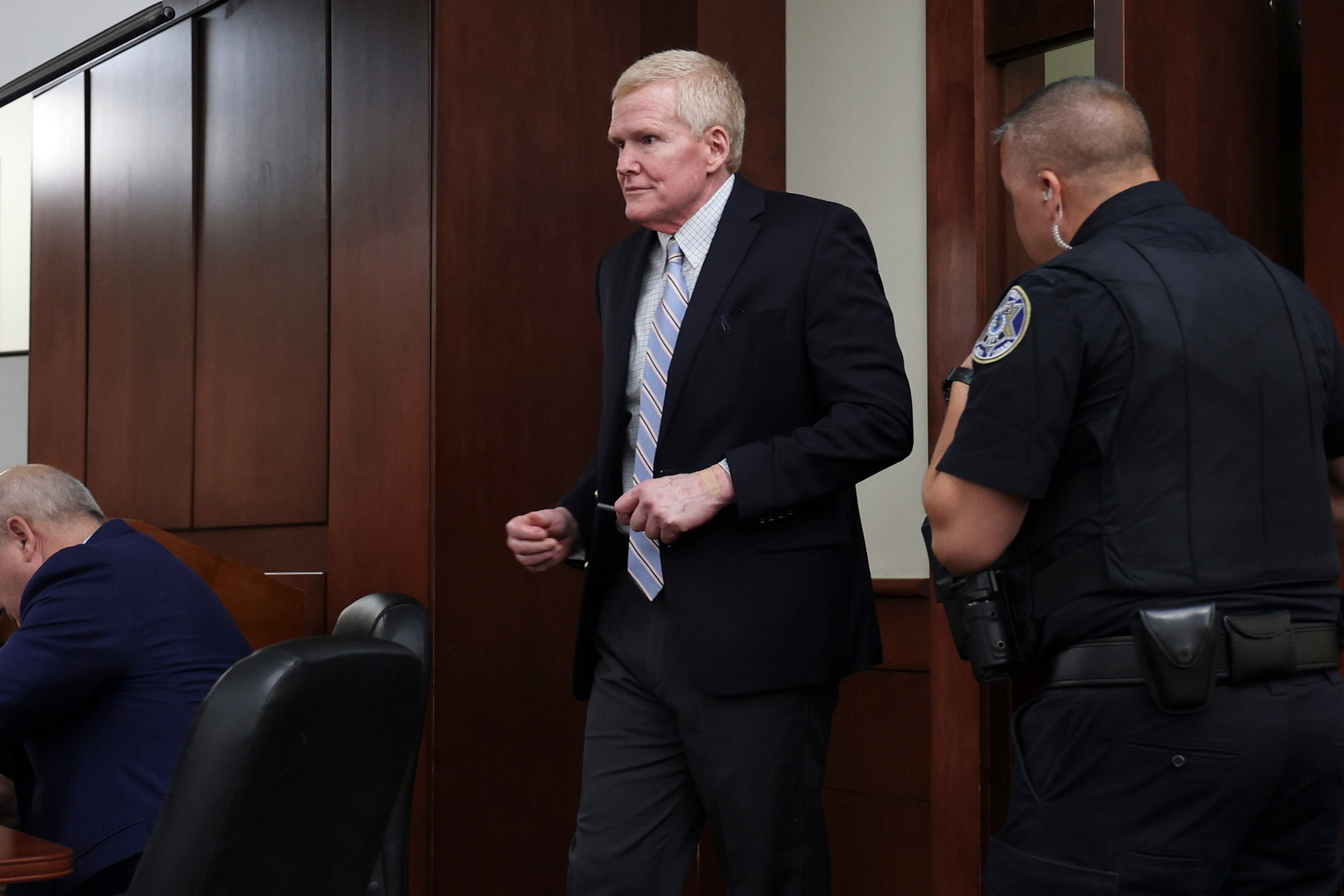 Alex Murdaugh enters the courtroom for a hearing, Aug. 14, at the Marc H. Westbrook Judicial Center in Lexington, S.C. Murdaugh's legal team returned to court for another hearing over evidence disputes on Friday.