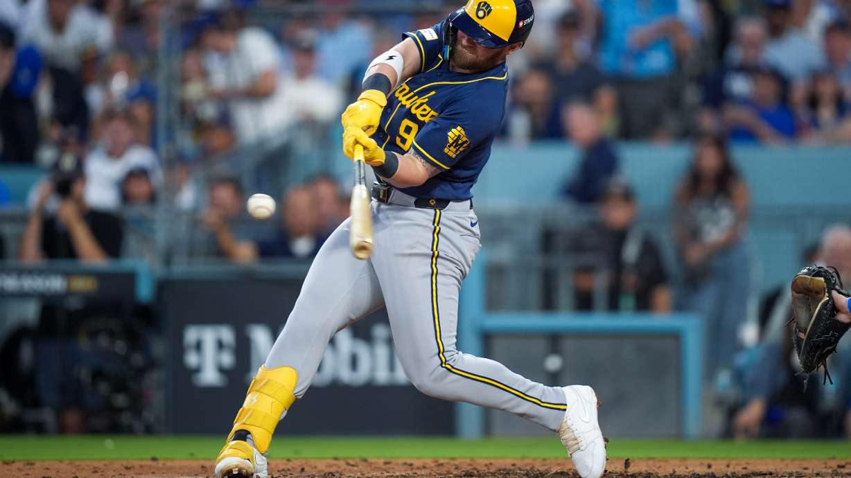 Milwaukee Brewers first baseman Jake Bauers connects for a two-RBI double during the fourth inning of Game 4 of baseball's National League Championship Series between the Milwaukee Brewers and the Los Angeles Dodgers, Thursday, Oct. 15, 2026, in Los Angeles.