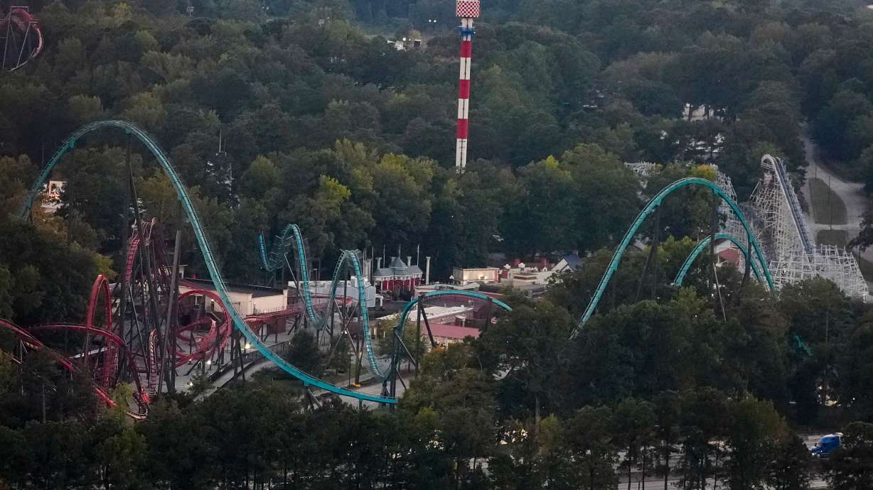 Attractions are seen at Six Flags Over Georgia, about 15 miles northwest of Atlanta, Thursday, in Mableton. The park is expected to reopen Friday evening.