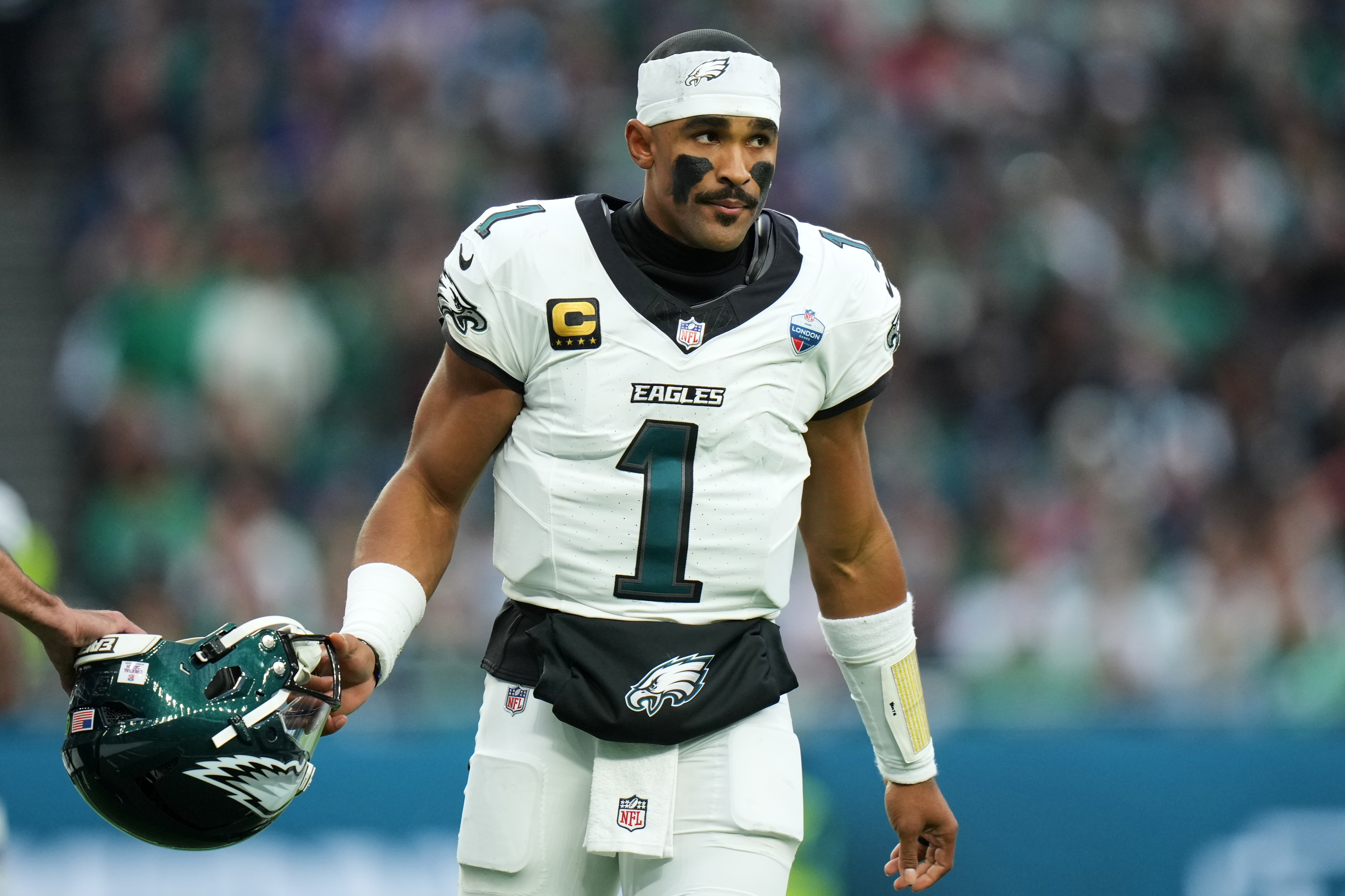Philadelphia Eagles quarterback Jalen Hurts (1) stands on the field during an NFL football game against Jacksonville Jaguars in London, Sunday, Oct. 11, 2026. 