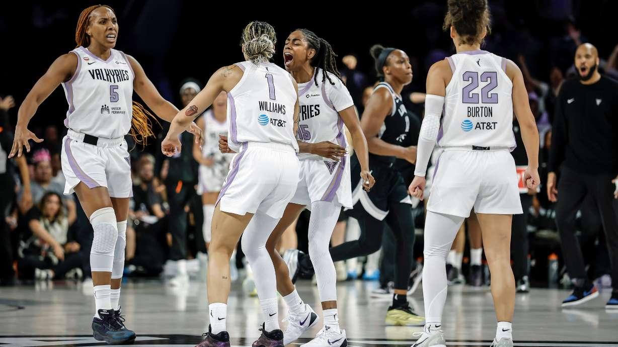 Golden State Valkyries players gather to celebrate teammate Gabby Williams's (1) 2-point basket in the final seconds of overtime as the team defeated the Las Vegas Aces in Game 3 of the WNBA basketball semifinals Friday, Oct. 9, 2026, in Las Vegas.