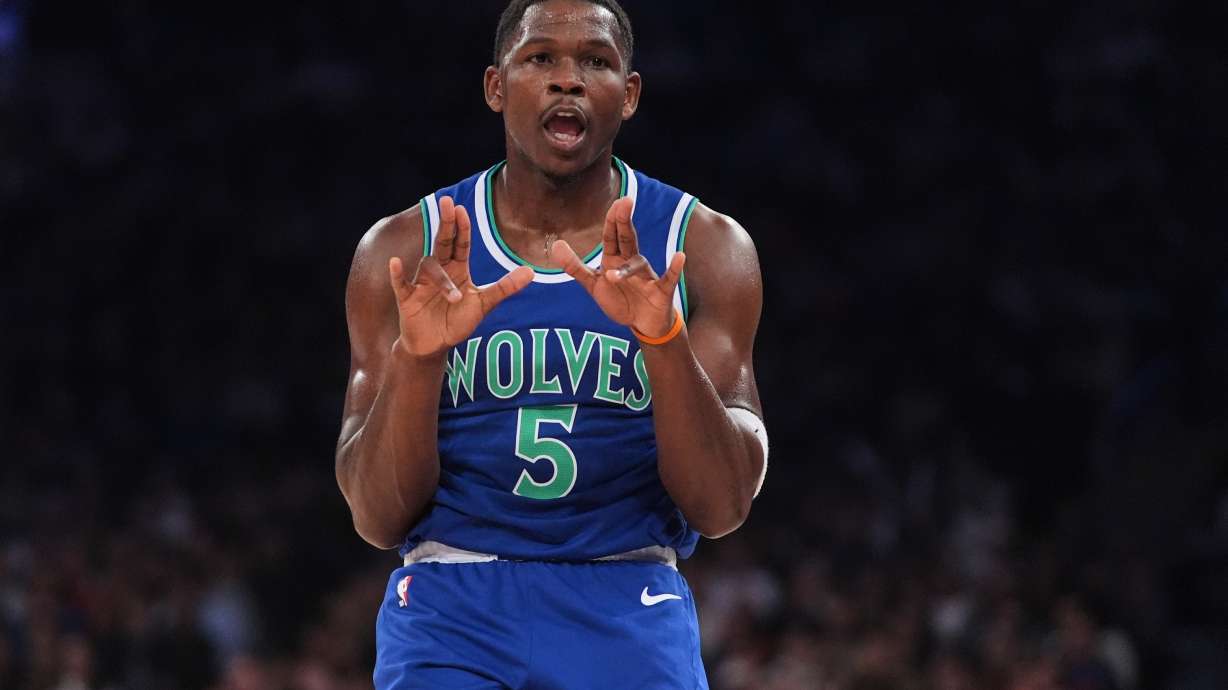 Minnesota Timberwolves' Anthony Edwards (5) gestures after making a three-point shot during the first half of a preseason NBA basketball game against the New York Knicks Monday, Oct. 12, 2026, in New York.