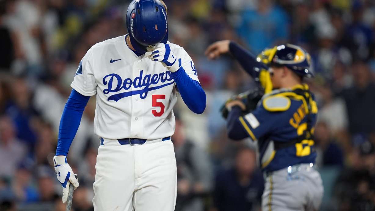 Los Angeles Dodgers first baseman Freddie Freeman walks to the dugout after striking out during the fifth inning of Game 4 of baseball's National League Championship Series between the Milwaukee Brewers and the Los Angeles Dodgers, Thursday, Oct. 15, 2026, in Los Angeles.