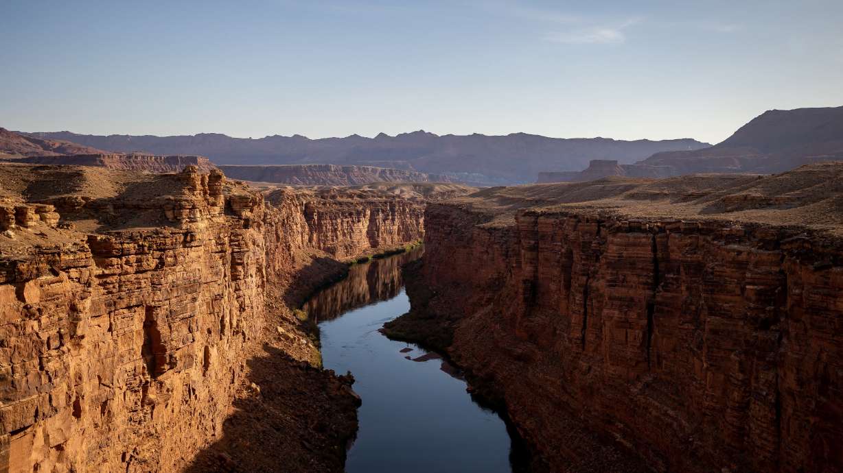 The Colorado River flows through Marble Canyon as seen from the Historic Navajo Bridge in Coconino County, Ariz., on July 20, 2022.