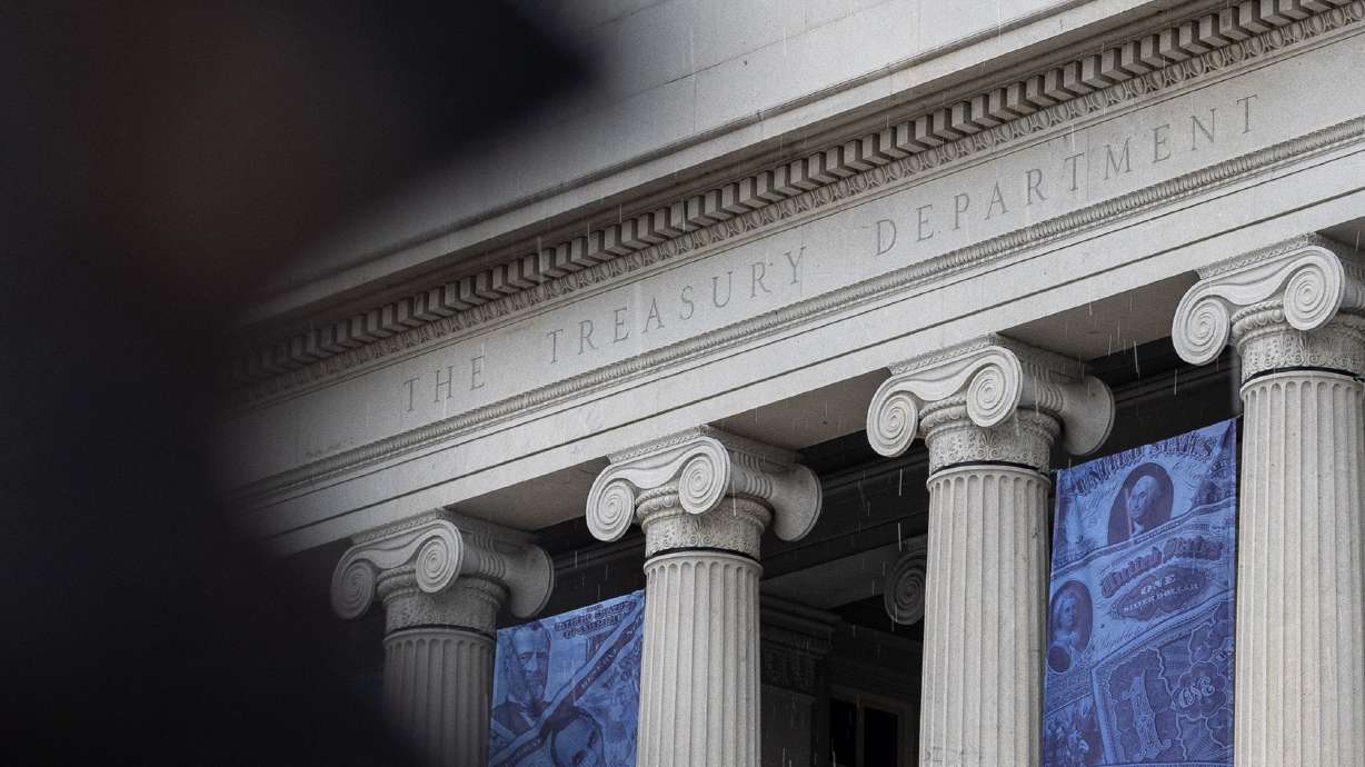 The federal budget deficit rose to nearly $2 trillion for the past fiscal year, which ended Sept. 30, the Treasury Department reported Friday.