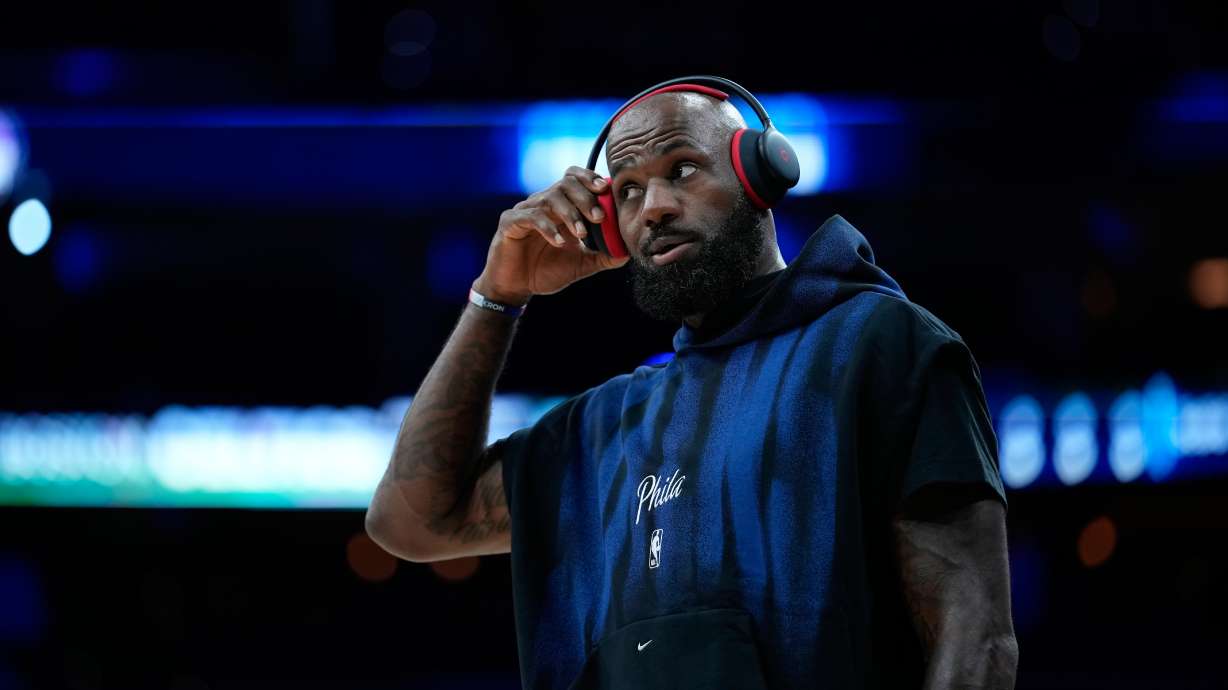 Philadelphia 76ers' LeBron James warms up before a preseason NBA basketball game against the Boston Celtics Friday, Oct. 16, 2026, in Philadelphia.