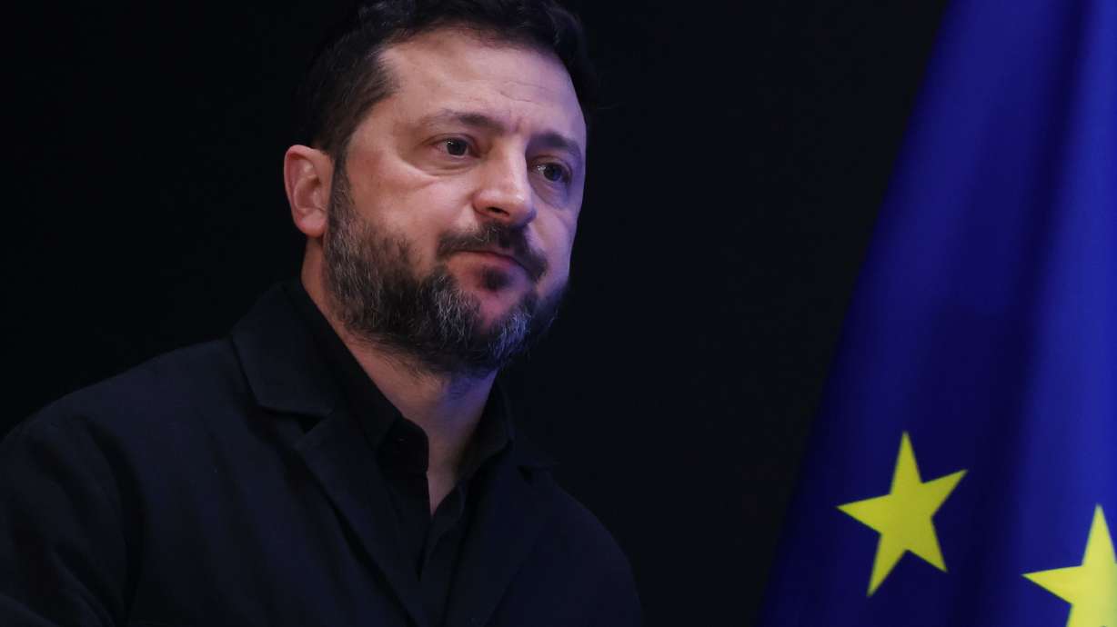 Ukraine's President Volodymyr Zelenskyy arrives for a media conference at the EU summit in Brussels, Friday.