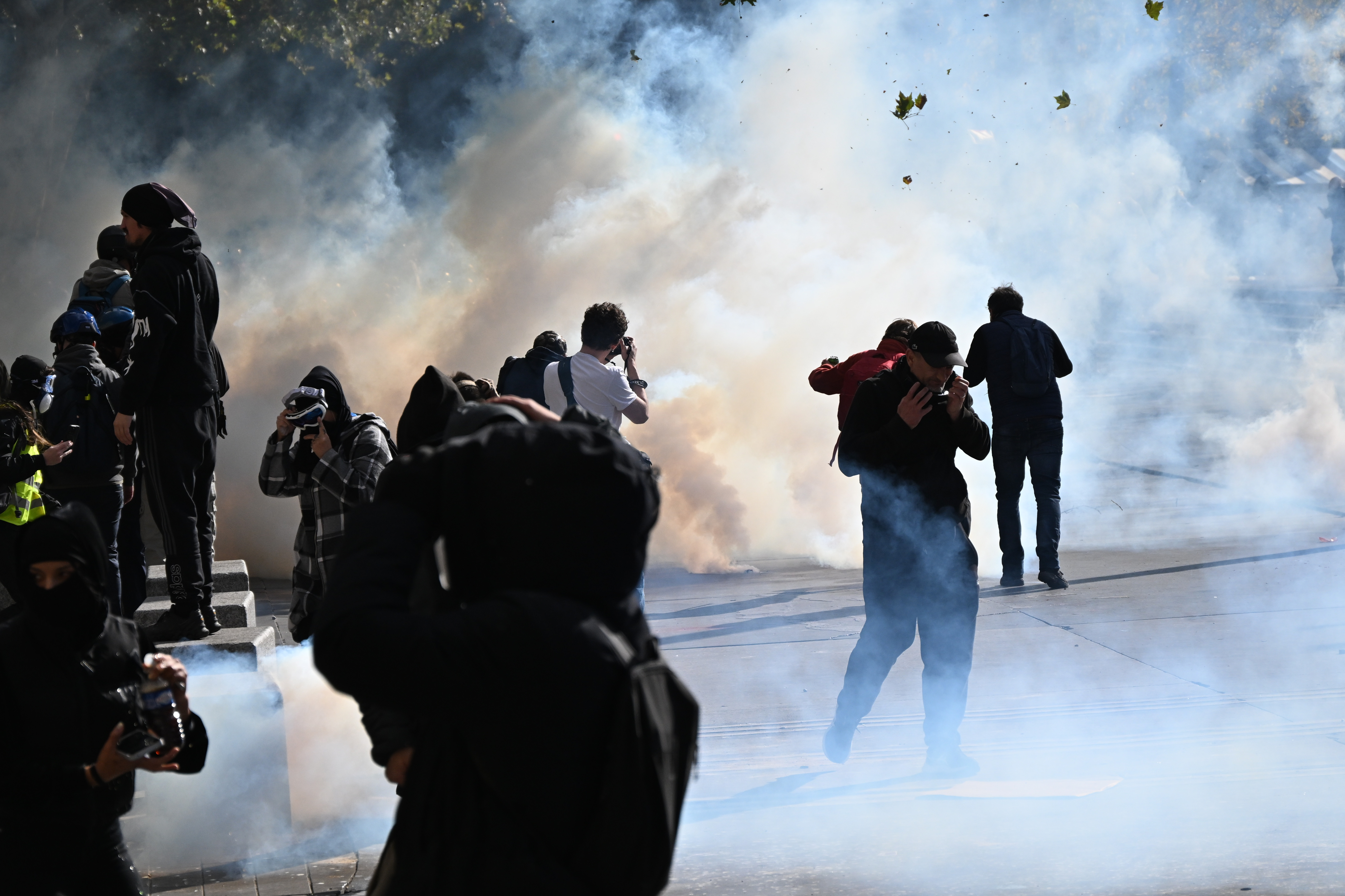 Clashes and fires break out as protesters rally across France, joining students