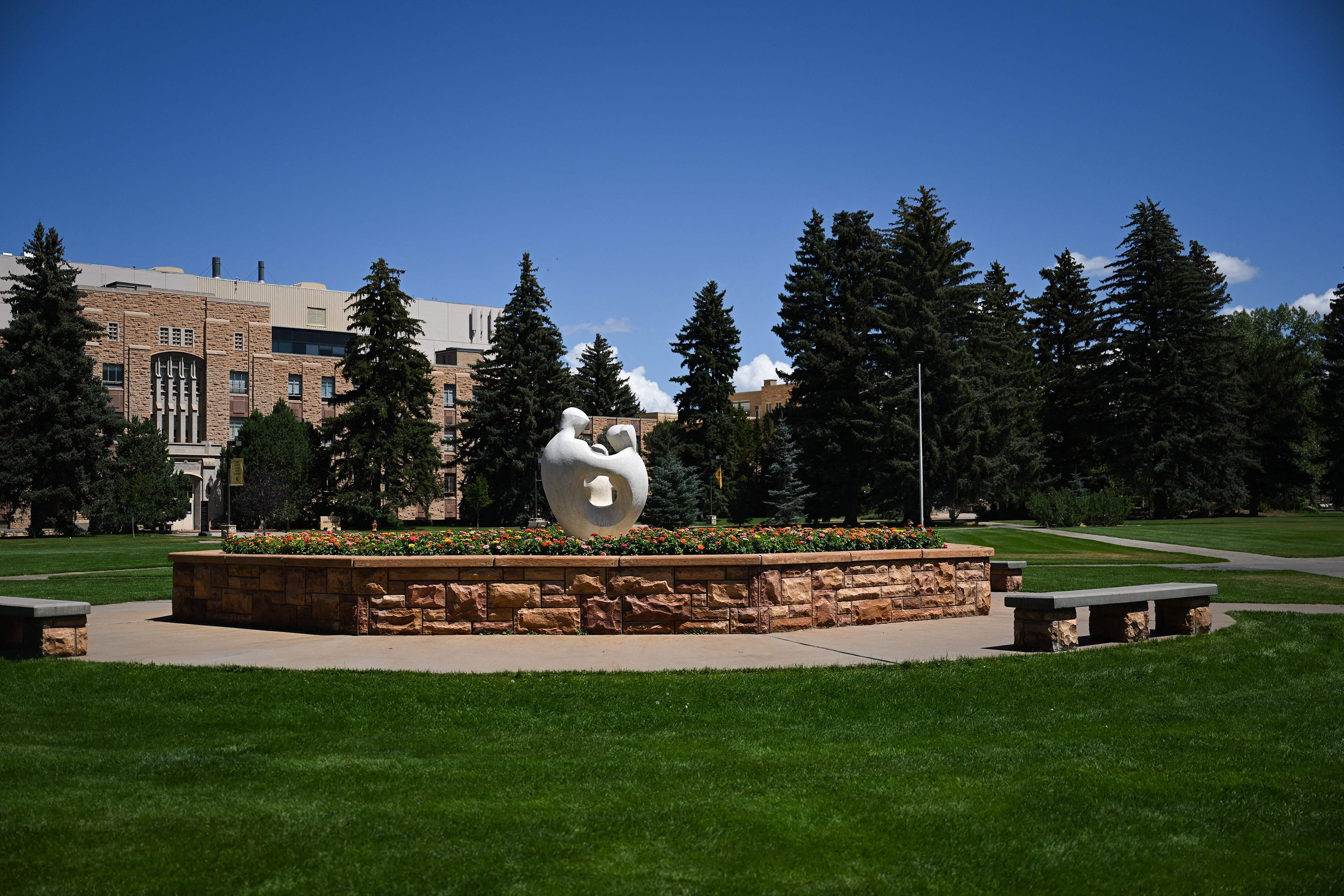 The University Family statue stands on the University of Wyoming campus in Laramie, Wyoming, in 2022.