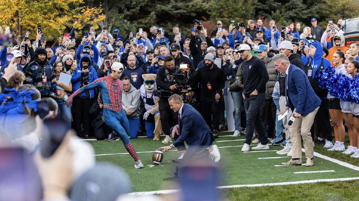 BYU student Carter Smith kicks a field goal during the ESPN College Gameday show near the Helaman Halls on BYU campus in Provo Saturday.
