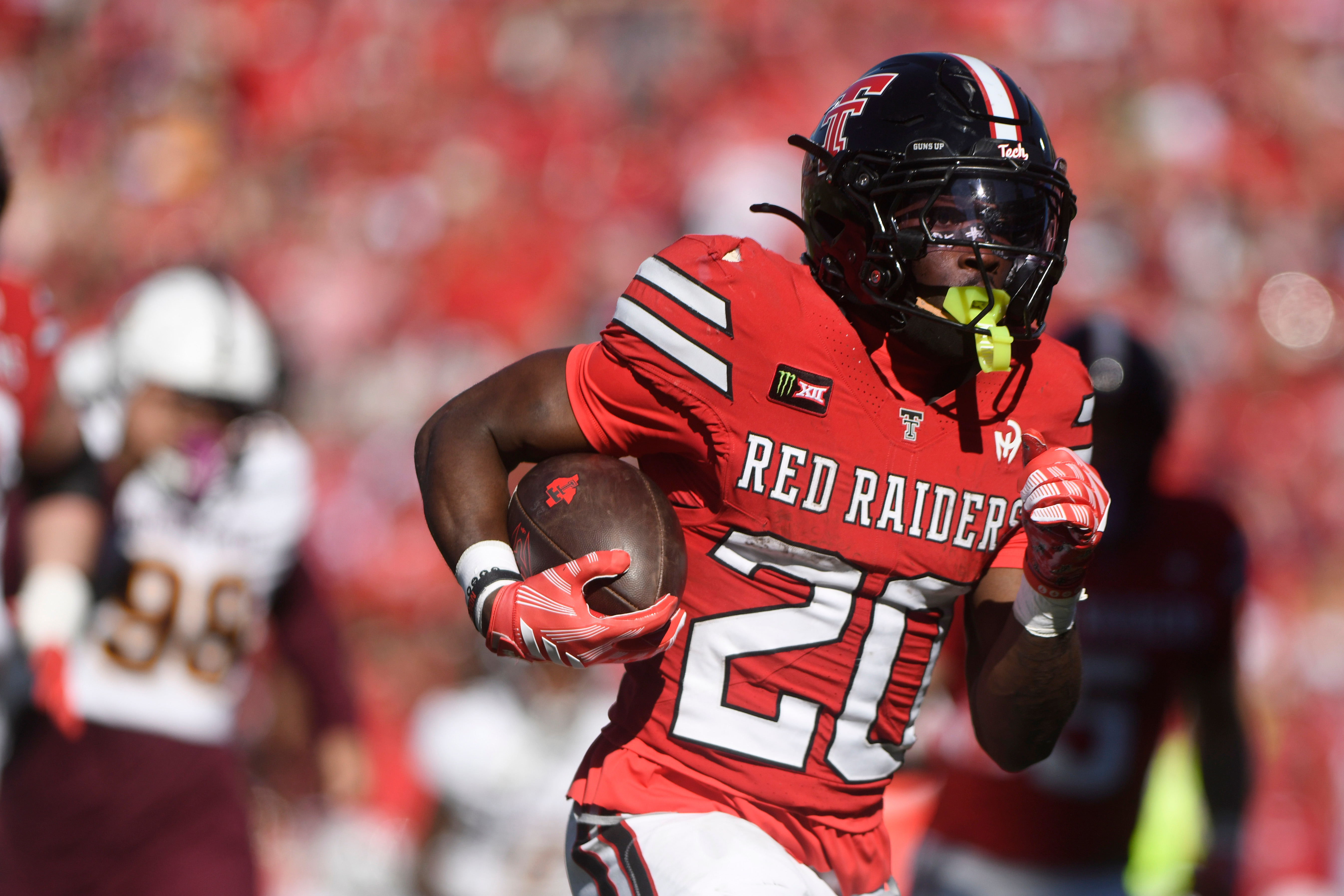 Texas Tech running back J'koby Williams (20) runs for a touchdown during the first half of an NCAA college football game against Arizona State, Saturday, Oct. 17, 2026, in Lubbock, Texas. 