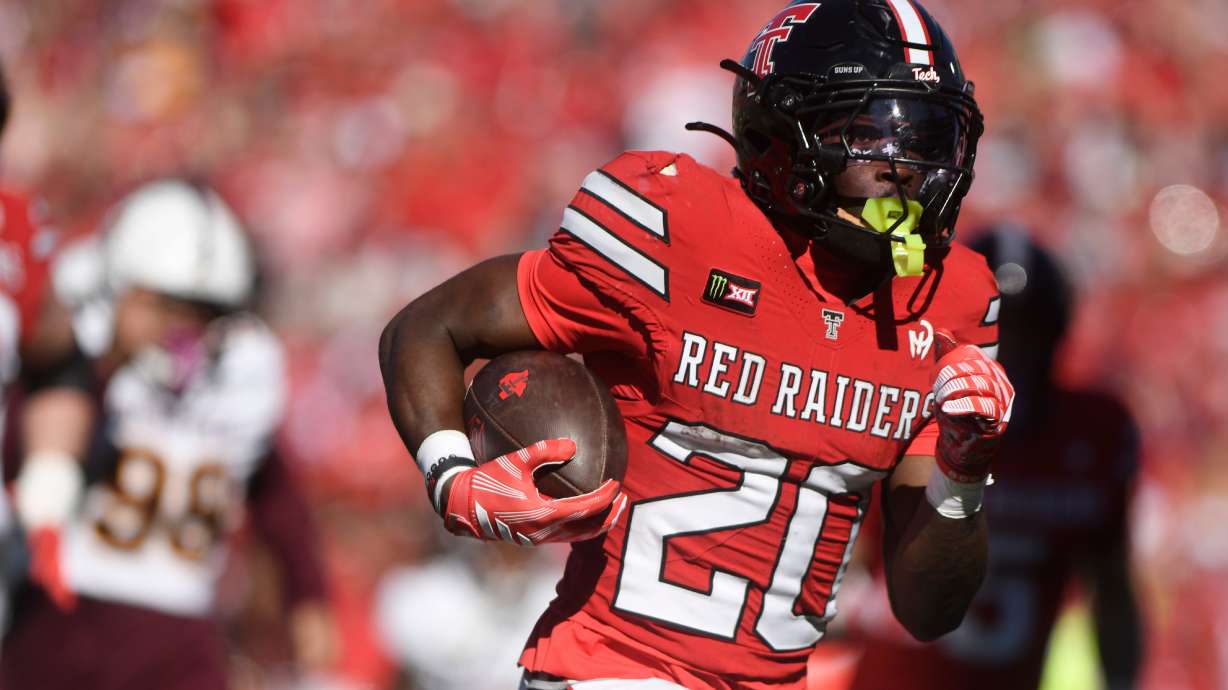 Texas Tech running back J'koby Williams (20) runs for a touchdown during the first half of an NCAA college football game against Arizona State, Saturday, Oct. 17, 2026, in Lubbock, Texas.