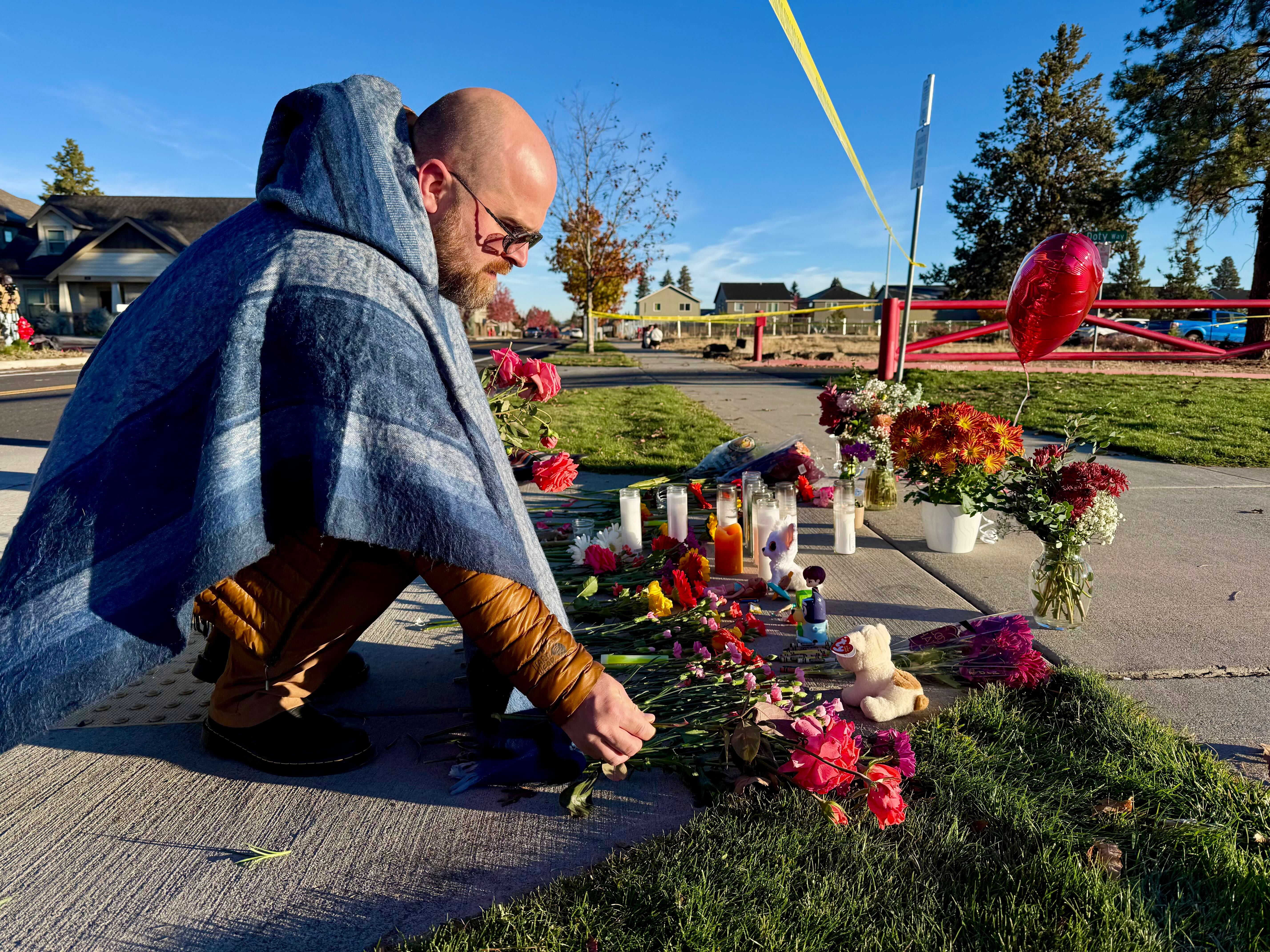 As an Oregon community mourns 4 killed in school shooting, 2 survivors remain hospitalized