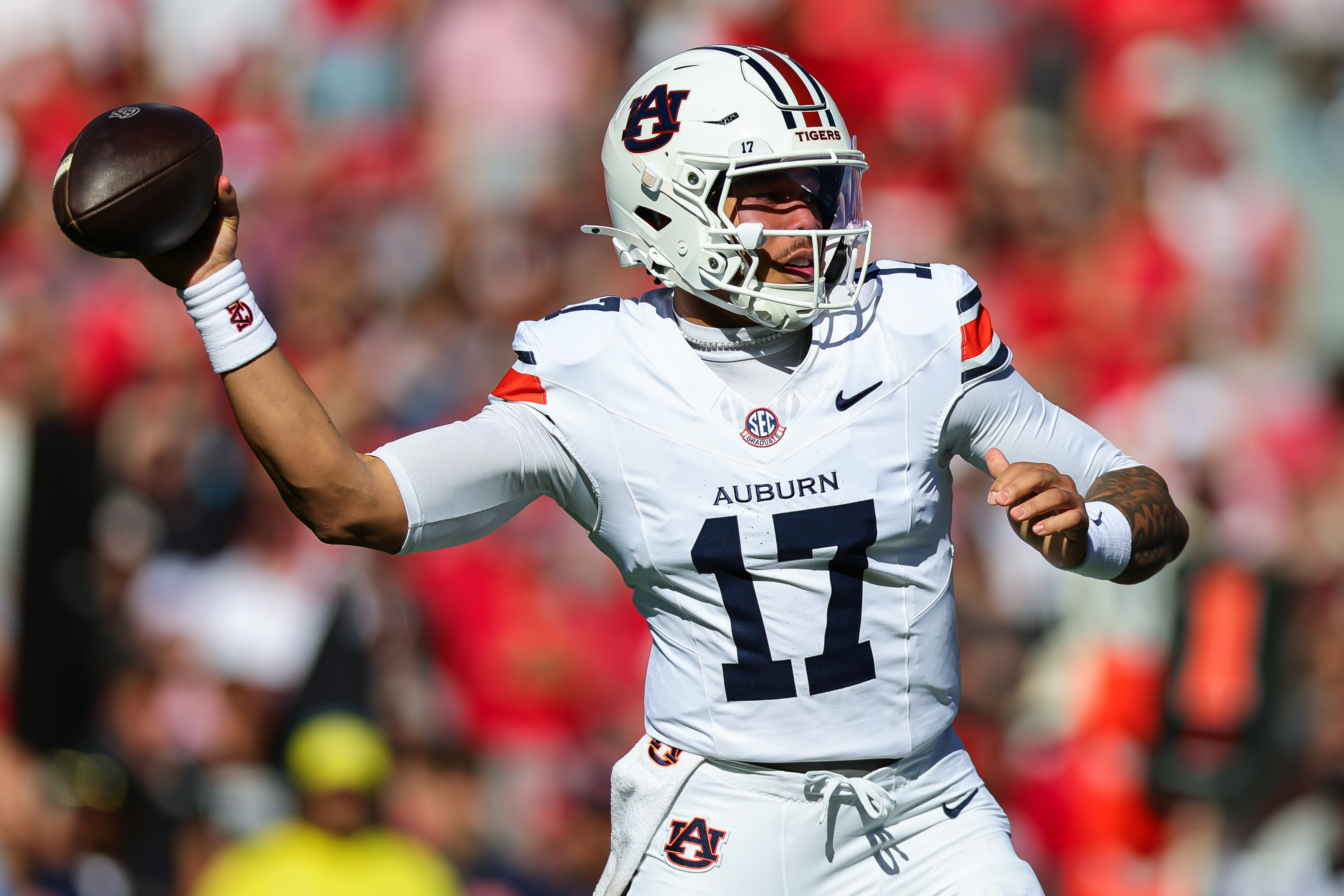 Auburn quarterback Byrum Brown (17) throws a pass during the first half of an NCAA college football game against Georgia, Saturday, Oct. 17, 2026, in Athens, Ga. 