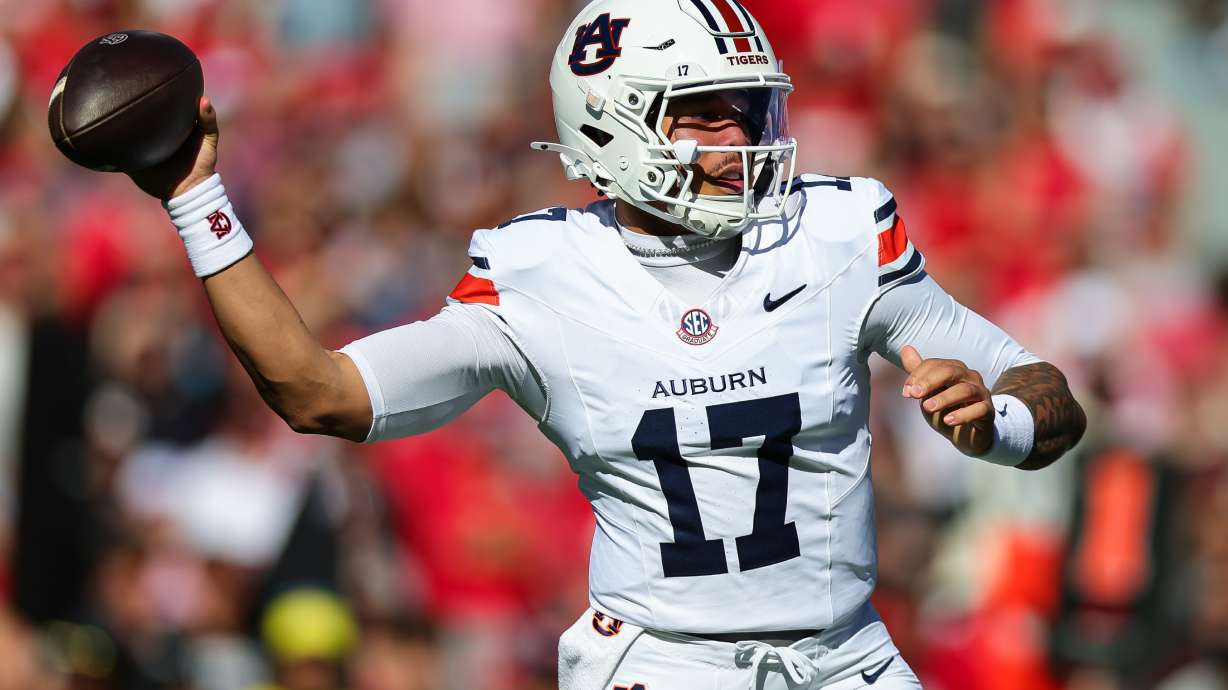 Auburn quarterback Byrum Brown (17) throws a pass during the first half of an NCAA college football game against Georgia, Saturday, Oct. 17, 2026, in Athens, Ga.