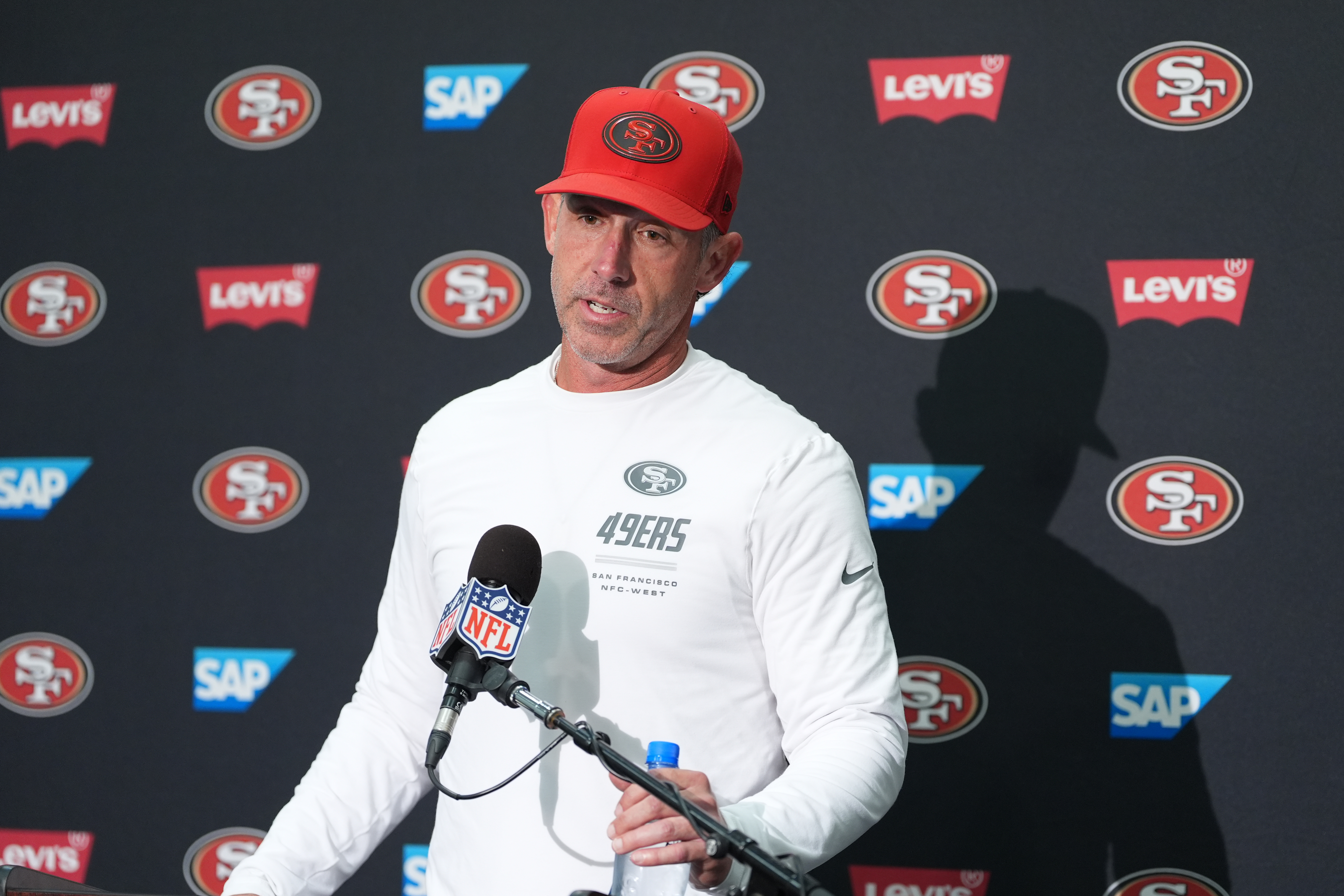 San Francisco 49ers head coach Kyle Shanahan speaks to reporters following an NFL football game against the Seattle Seahawks, Sunday, Oct. 11, 2026, in Seattle. 