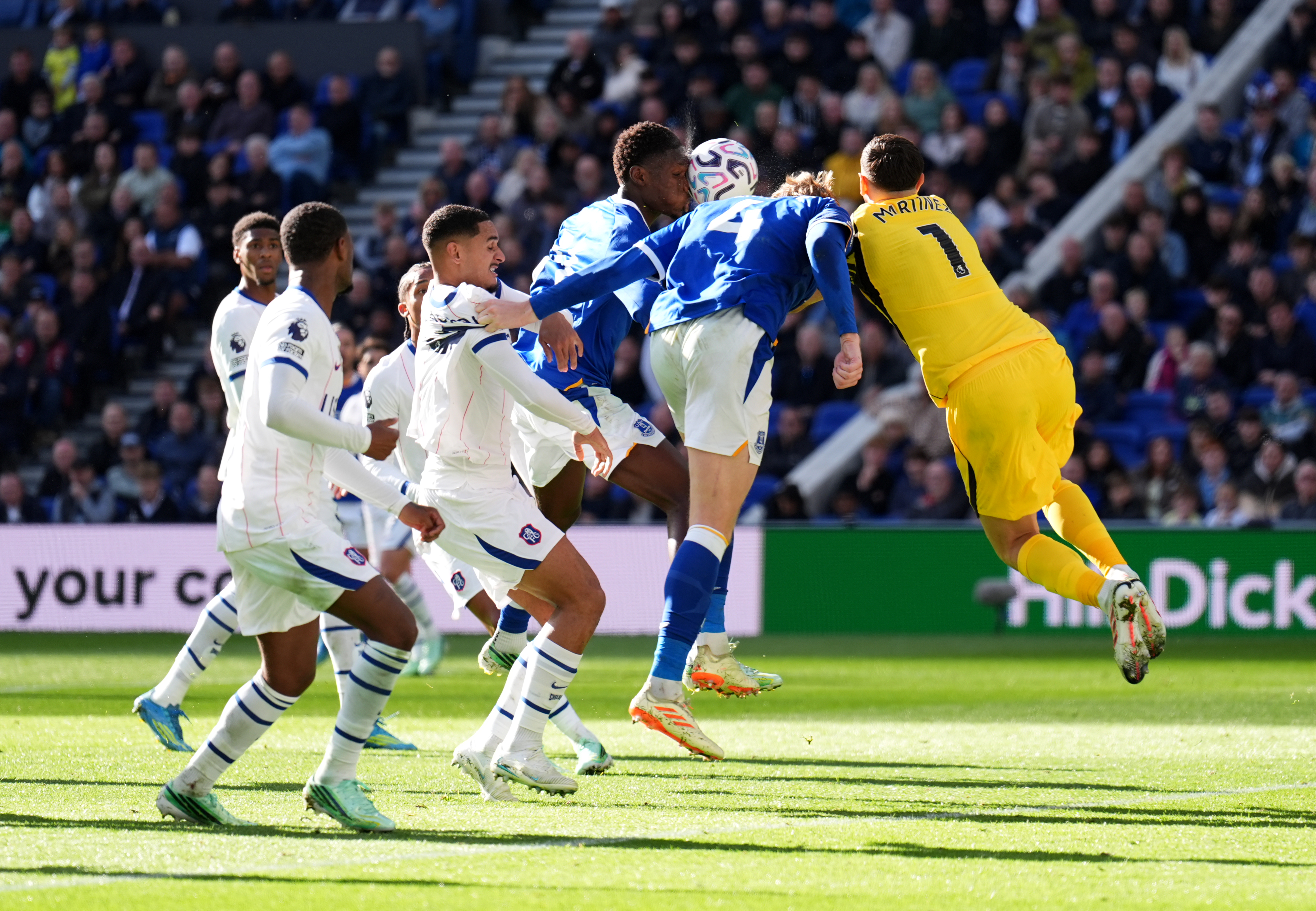 Chelsea goalkeeper Emiliano Martinez, right, picks up an injury during the English Premier League soccer match between Everton and Chelsea in Liverpool, England, Saturday, Oct. 17, 2026. 