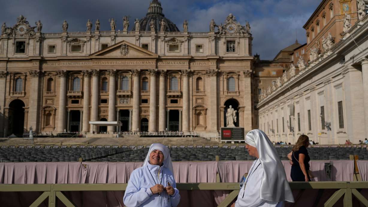 Two nuns arrive in St. Peter's Square at the Vatican for the traditional noon blessing after praying the Angelus with Pope Leo XIV, Sunday a day after he returned from the hospital, where he had lung cancer removed on Tuesday.