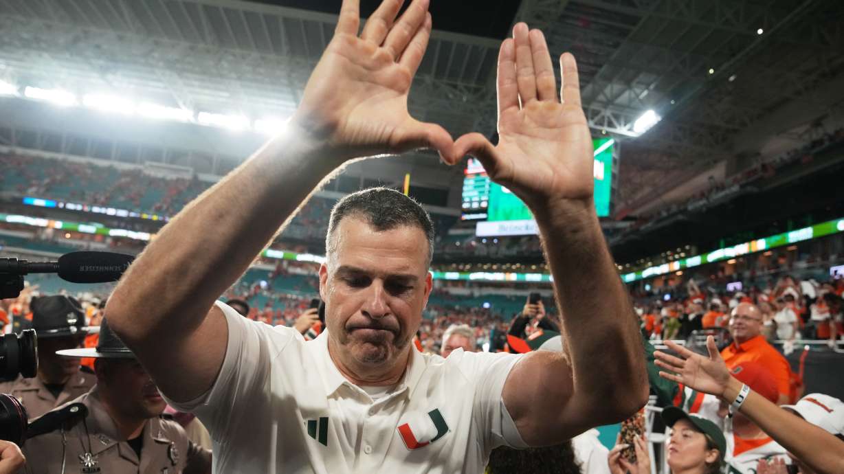 Miami head coach Mario Cristobal celebrates after Miami defeated Florida State in double overtime of an NCAA college football game, Saturday, Oct. 17, 2026, in Miami Gardens, Fla.