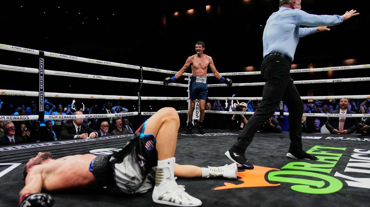 Sebastian Fundora, center rear, celebrates after knocking out Ermal Hadribeaj during a super welterweight championship boxing match Saturday, Oct. 17, 2026, in Las Vegas.