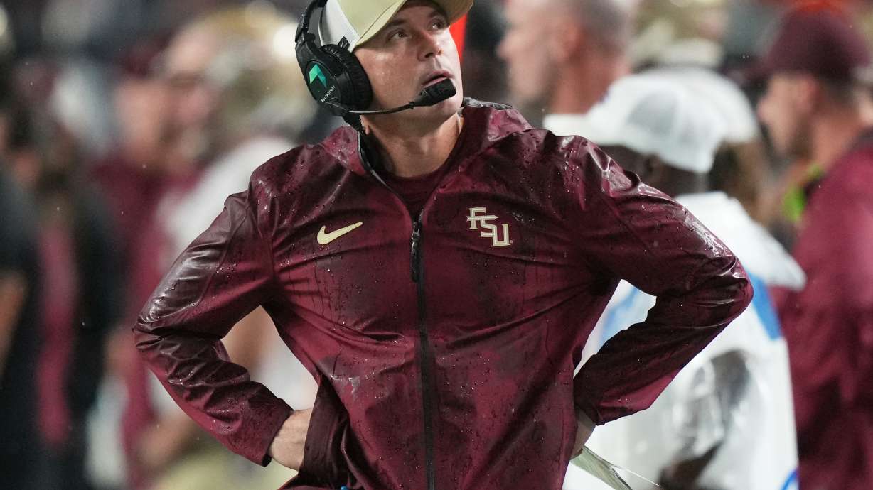 Florida State head coach Mike Norvell watches from the sideline during the first half of an NCAA college football game against Miami, Saturday, Oct. 17, 2026, in Miami Gardens, Fla.