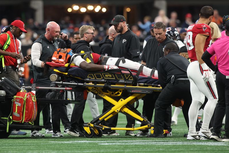 Oct 18, 2026; Atlanta, Georgia, USA;  Atlanta Falcons linebacker Kendal Daniels (53) is carted off field during the third quarter against the Chicago Bears at Mercedes-Benz Stadium.