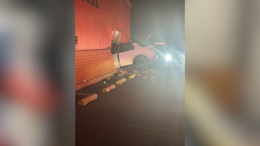 Woman accused of crashing into bowling alley twice, causing $130K in damage