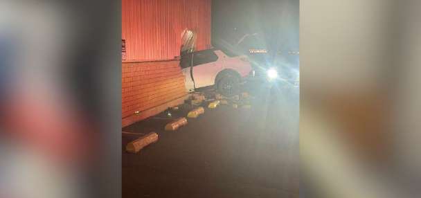 Woman accused of crashing into bowling alley twice, causing $130K in damage