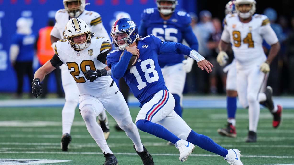 New York Giants quarterback J.J. McCarthy (18) runs the ball during the second half of an NFL football game against the New Orleans Saints in East Rutherford, N.J., Sunday, Oct. 18, 2026.