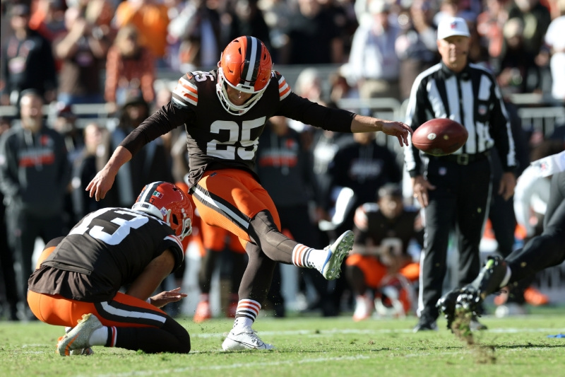 Oct 18, 2026; Cleveland, Ohio, USA;  Cleveland Browns kicker Andre Szmyt (25) kicks the game winning field goal on a hold from punter Corey Bojorquez (13) in the fourth quarter against the Baltimore Ravens  at Huntington Bank Field.
