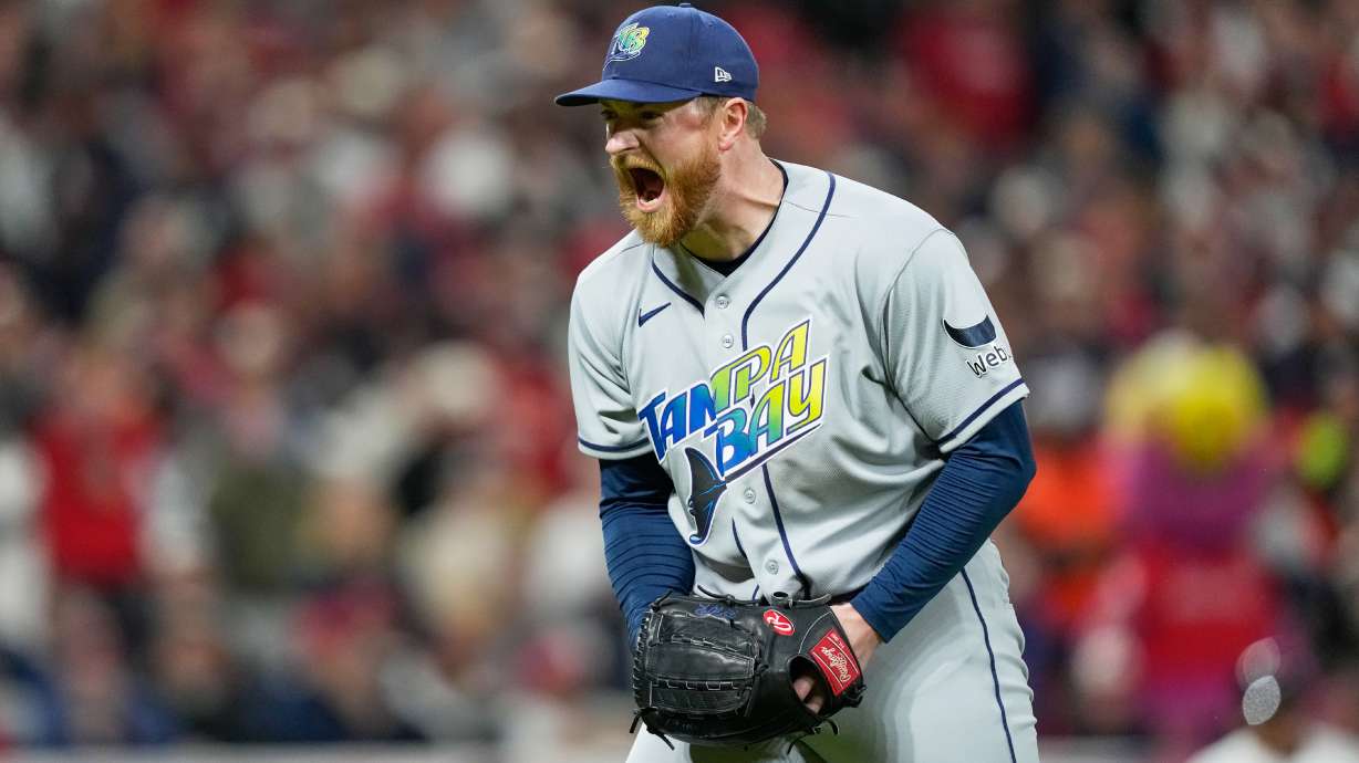 Tampa Bay Rays pitcher Drew Rasmussen celebrates the end of the seventh inning against the Cleveland Guardians in Game 5 of an American League Championship Series baseball game in Cleveland, Sunday, Oct. 18, 2026.