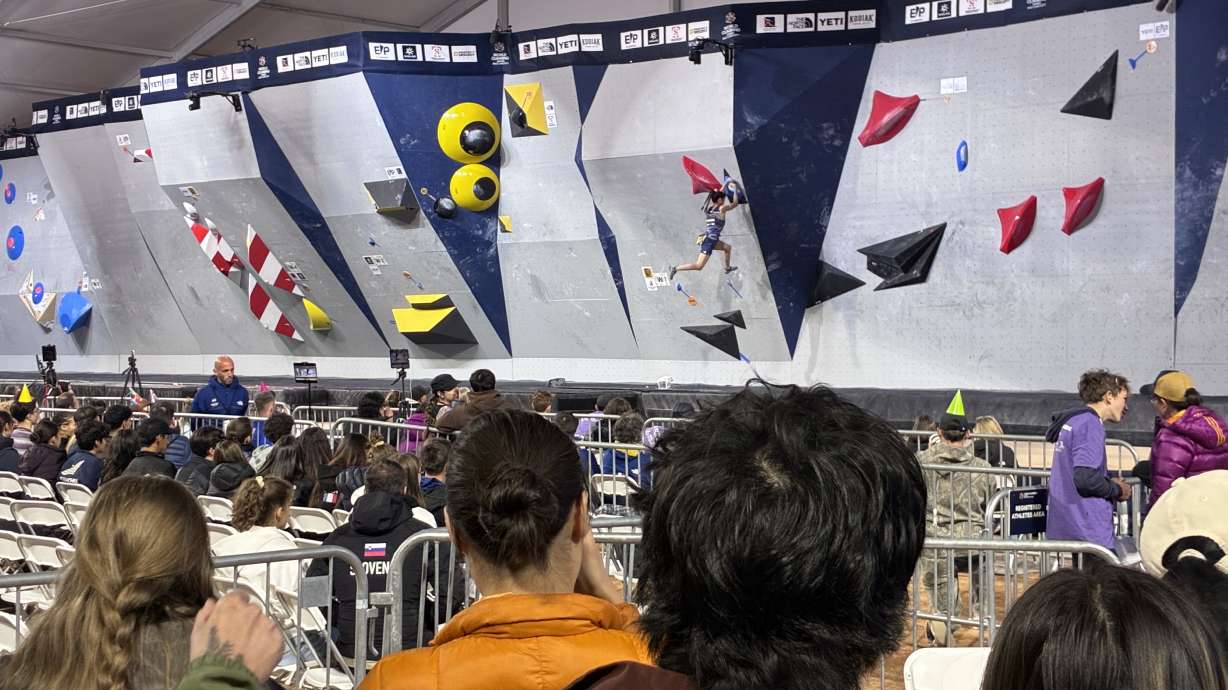 Japanese rock climber Mao Nakamura competes in the World Climbing Women's Championships at Smith's Ballpark on Saturday. Smith's Ballpark is known for baseball, but this weekend, climbing walls took center stage as Salt Lake City hosted an international bouldering competition.