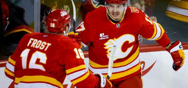Sharangovich breaks late tie as the Flames end the Hurricanes' 7-game winning streak
