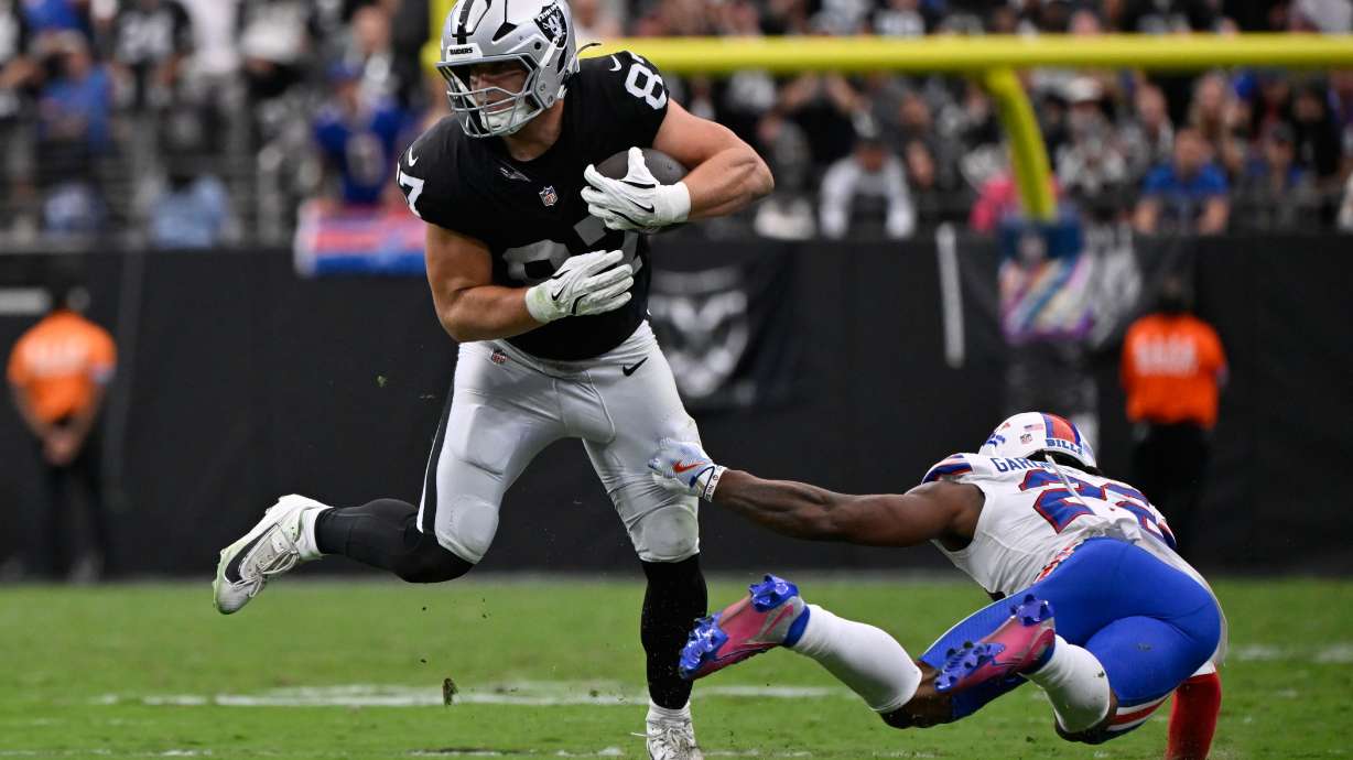 Las Vegas Raiders tight end Michael Mayer (87) makes a catch in front of Buffalo Bills safety C.J. Gardner-Johnson (22) during an NFL football game in Las Vegas, Sunday, Oct. 18, 2026.
