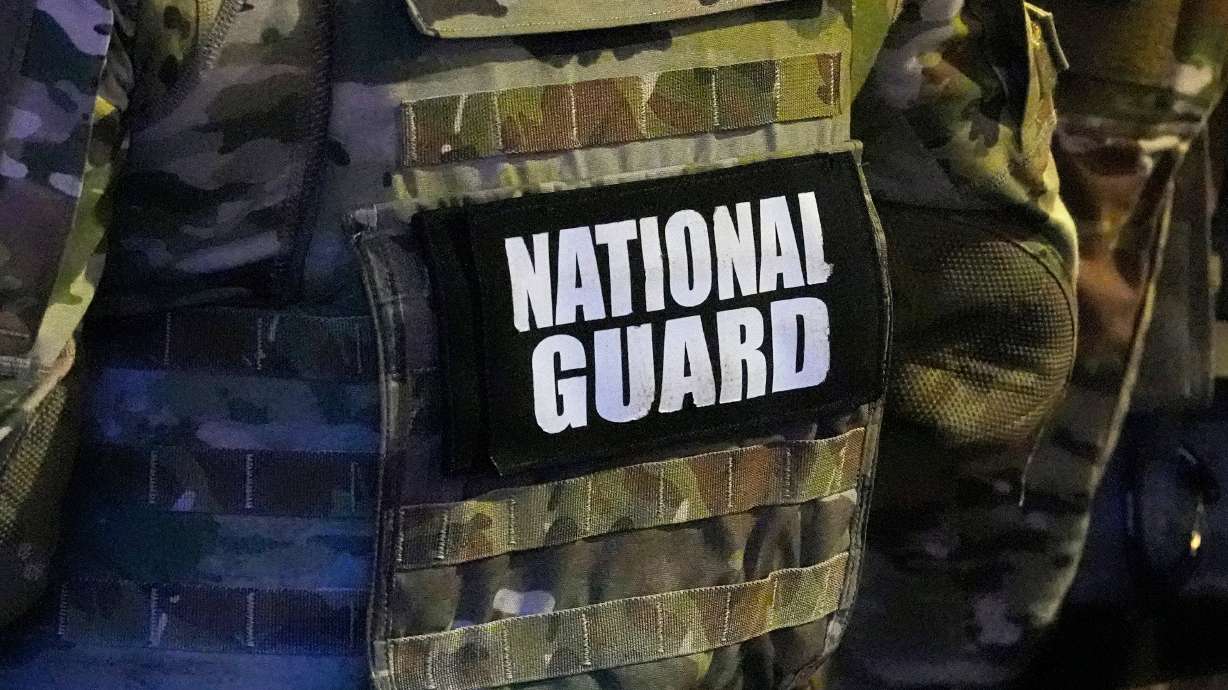 A member of the National Guard stands watch on Beale St., July 17, in Memphis, Tenn.